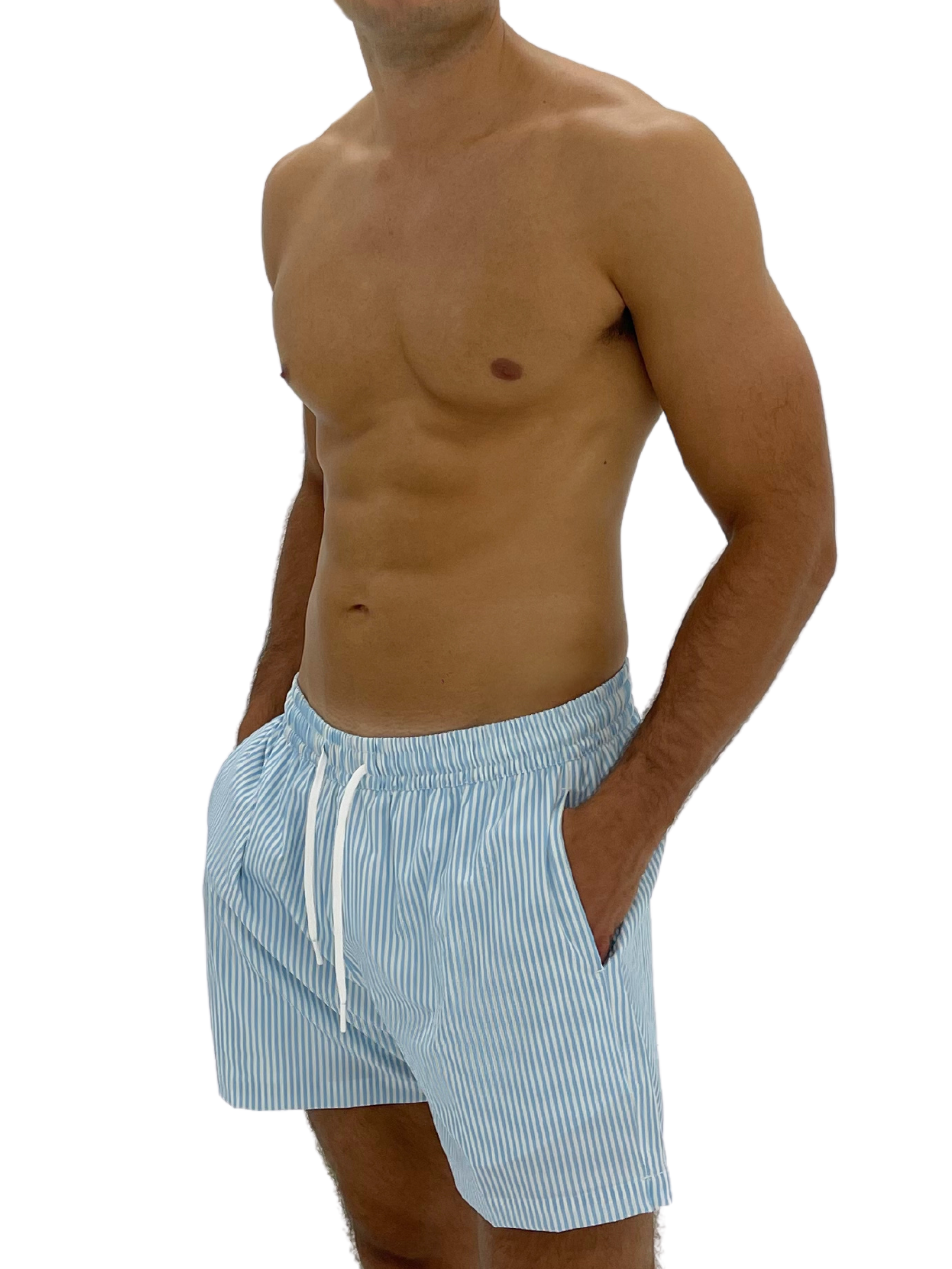 Hoekey blue and white striped men’s swim shorts with quick-dry fabric, elastic waistband, and adjustable drawstring for a tailored fit.