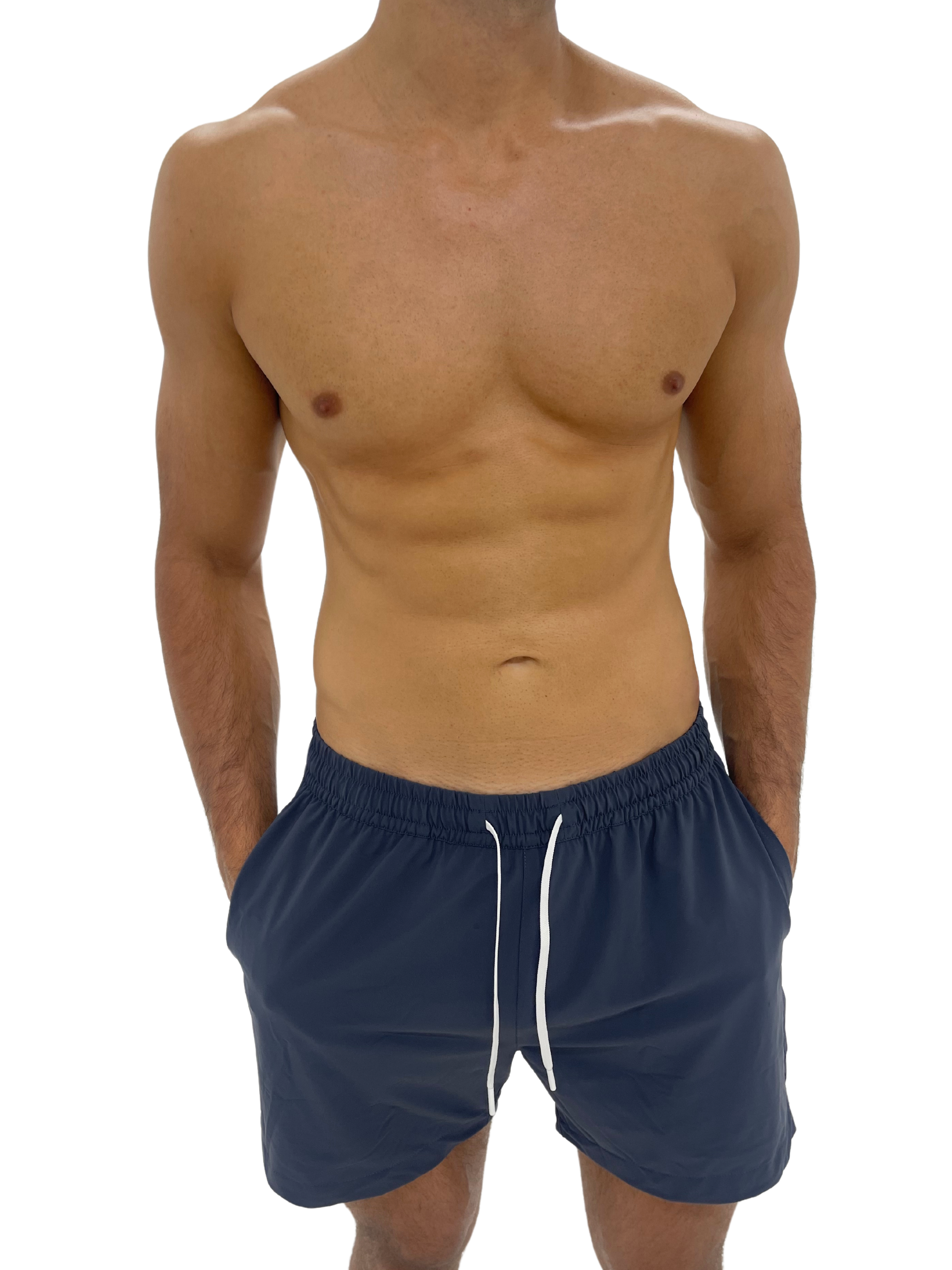 Hoekey gray men’s swim shorts with quick-dry fabric, adjustable white drawstring, and secure zippered pockets for functionality and style.