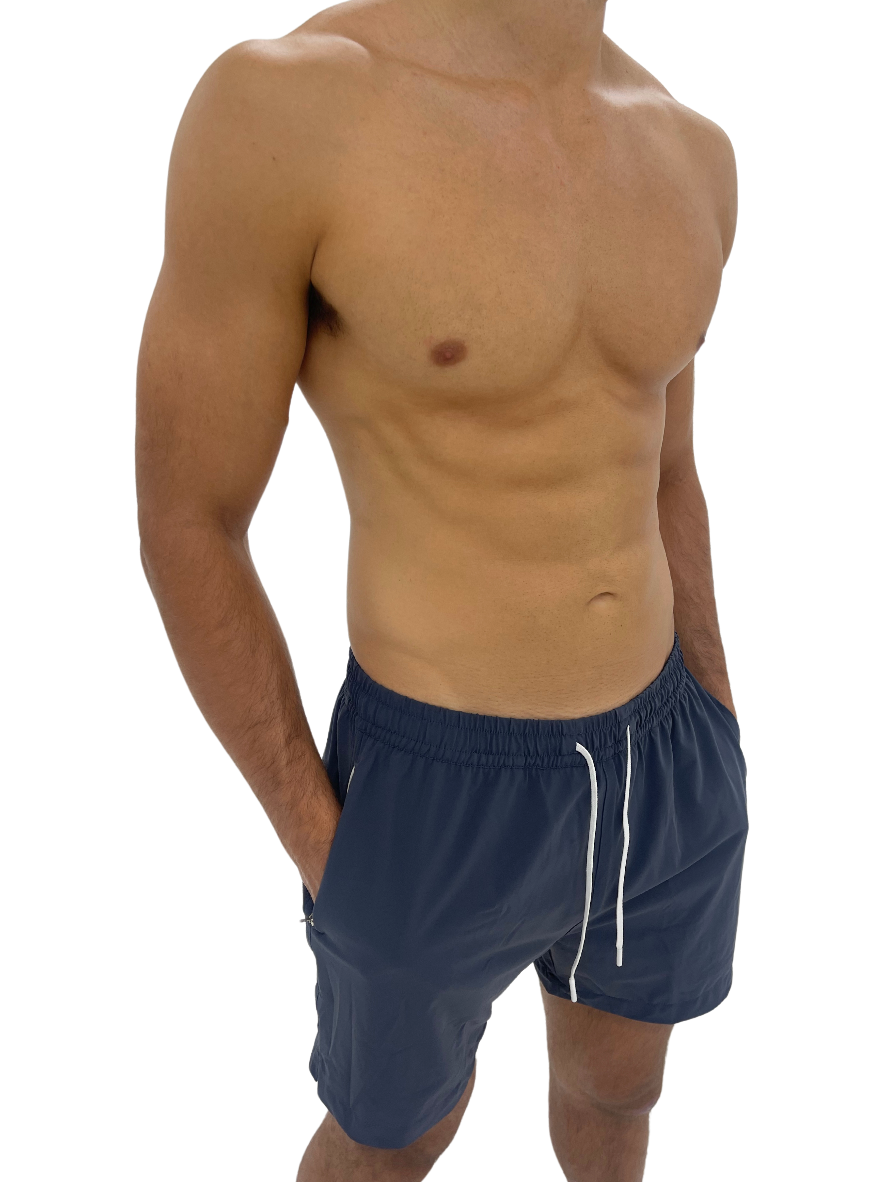 Hoekey gray men’s swim shorts with quick-dry fabric, adjustable white drawstring, and secure zippered pockets for all-day comfort and versatility.
