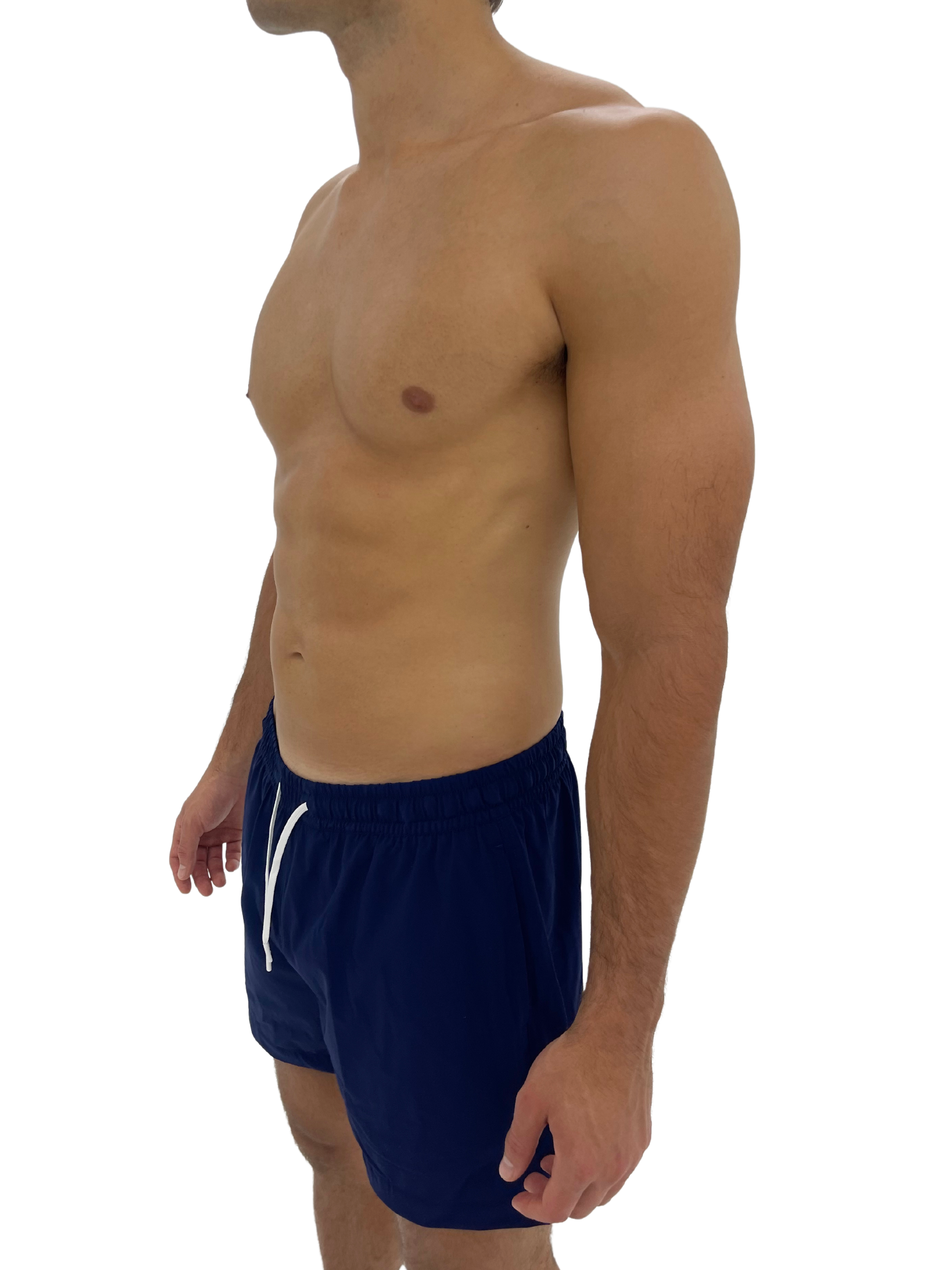 Hoekey men’s navy swim trunks designed with quick-dry fabric, adjustable drawstring, and a supportive liner for all-day comfort.