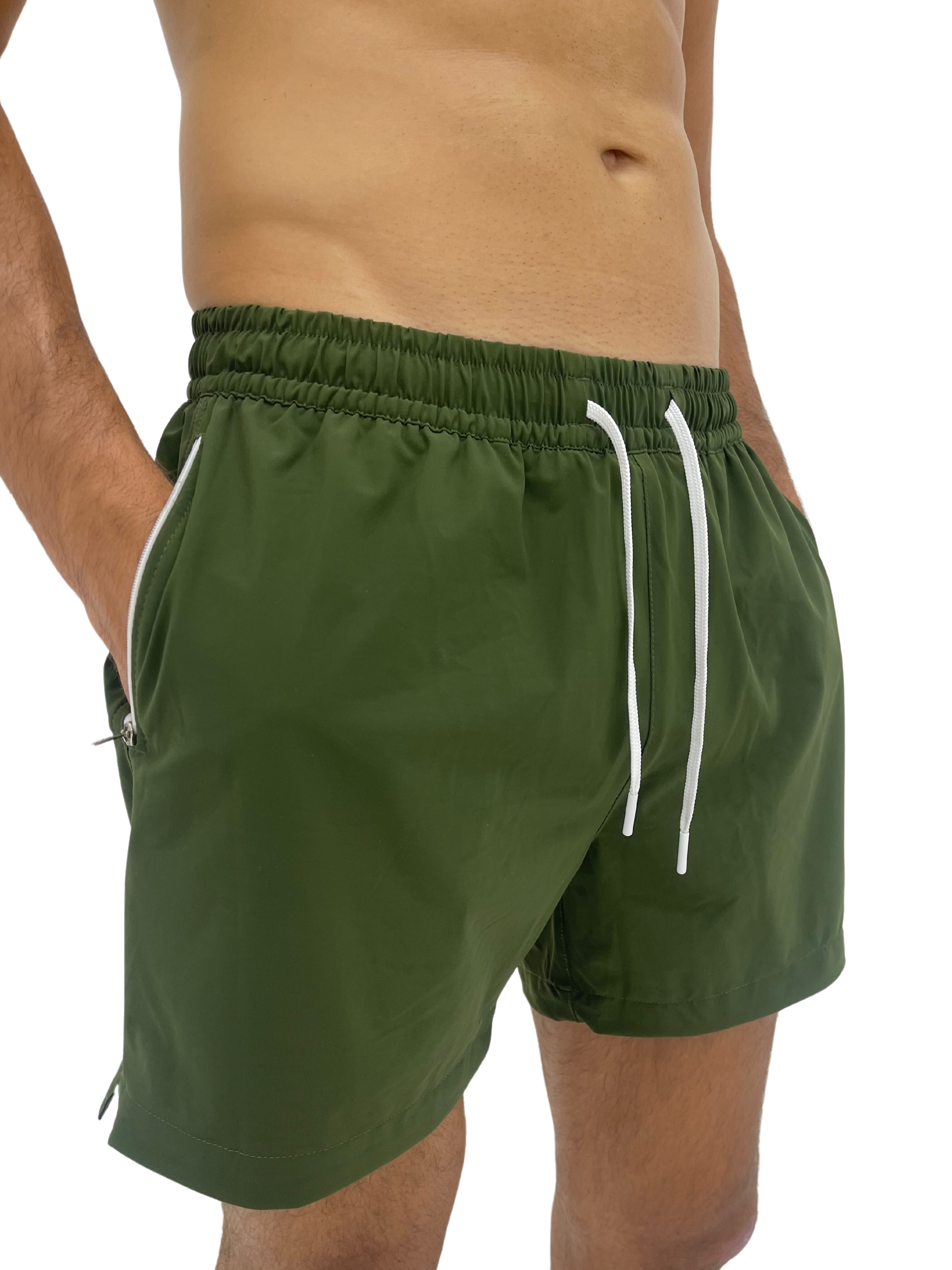 Hoekey olive green men’s swim shorts with quick-dry fabric, white adjustable drawstring, and zippered side pockets for secure storage and all-day comfort.