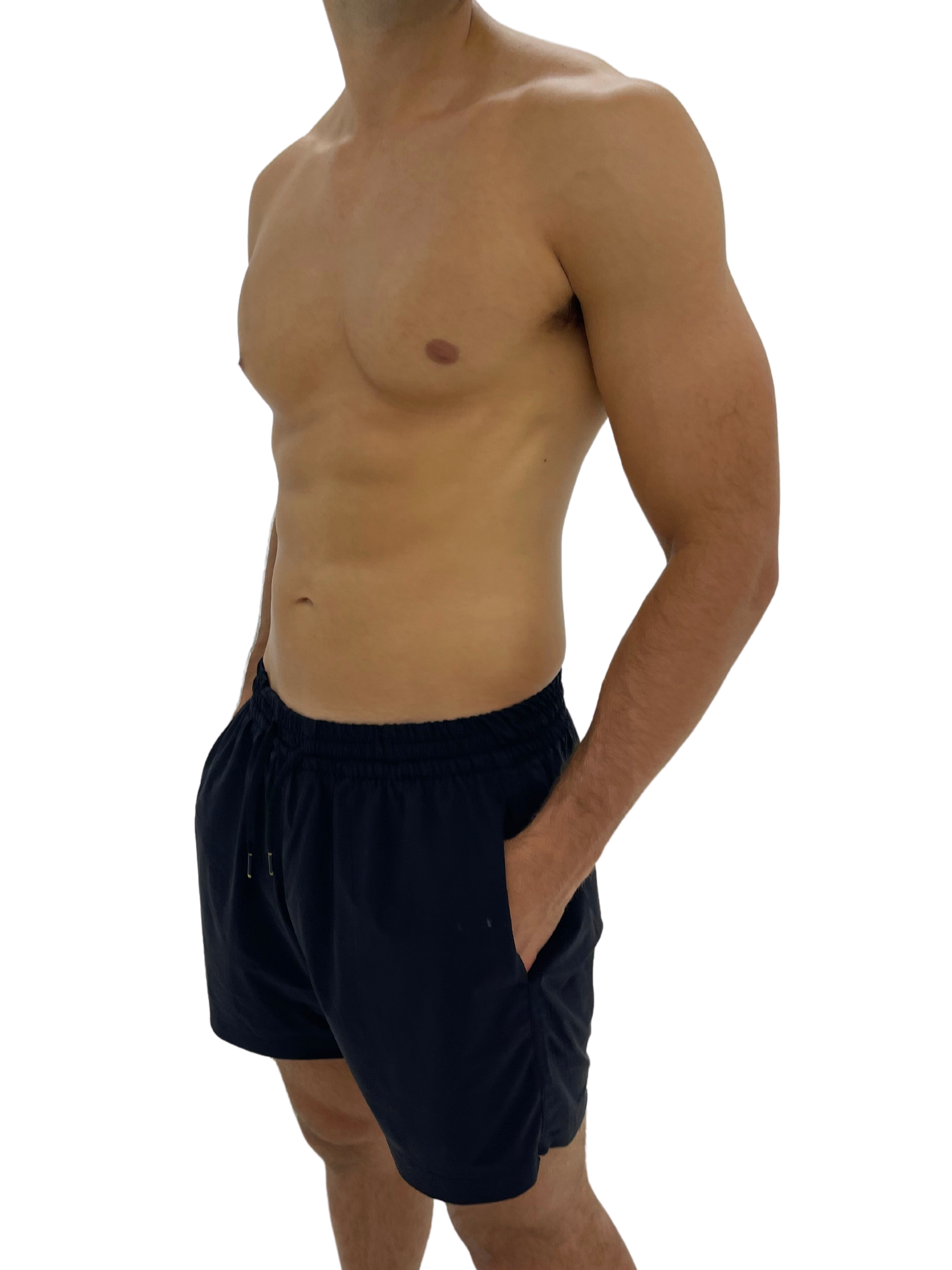 Hoekey men’s black swim shorts with quick-dry fabric, secure zippered pockets, and an elastic waistband.